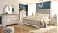 Realyn Queen Sleigh Bed with Mirrored Dresser, Chest and Nightstand